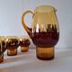 Carafe and its amber/golden glasses from the 70s.