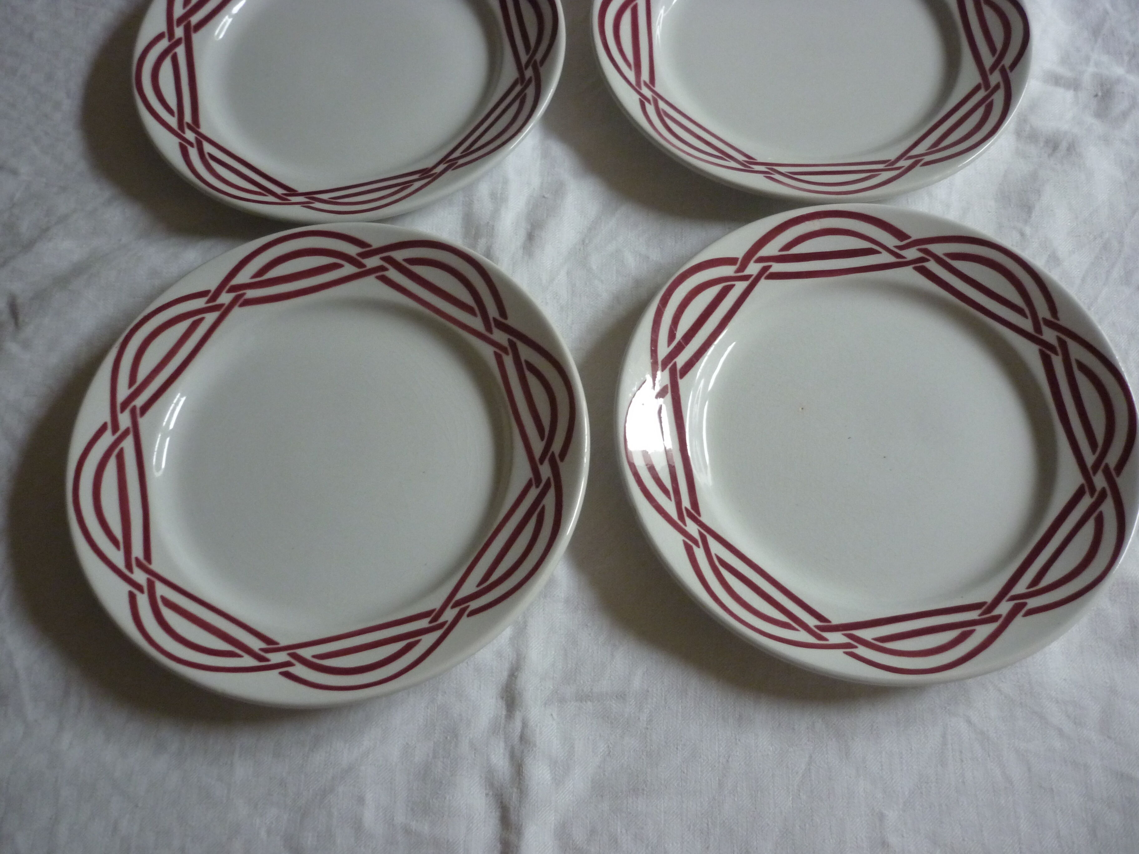 Set of 4 plates in red earthenware