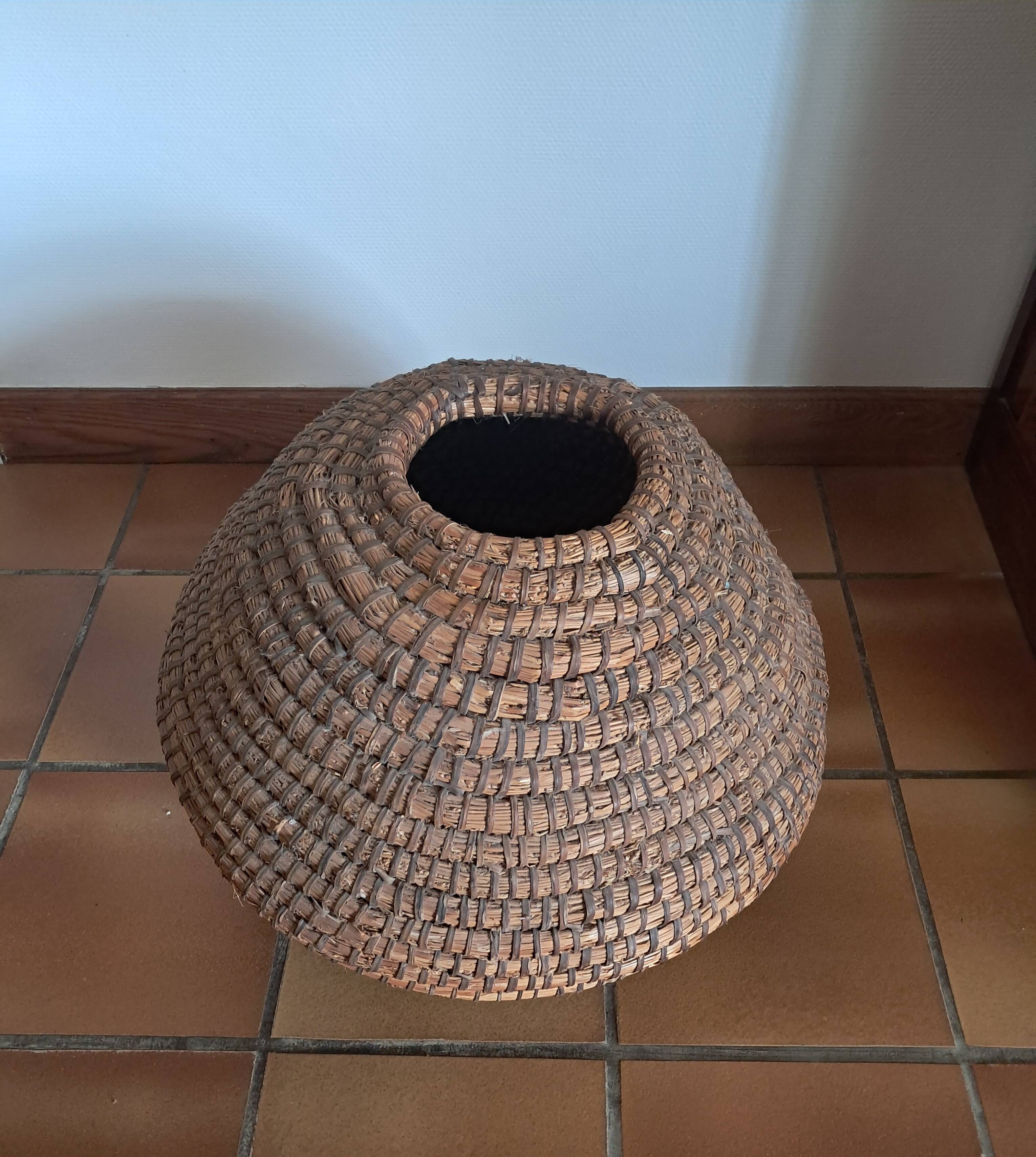 Woven basket. Early 20th century. Handcrafted work.