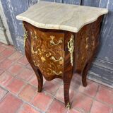 Louis XV commode with marquetry, gilded bronze and marble.