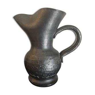 Black ceramic pitcher by Jean Marais