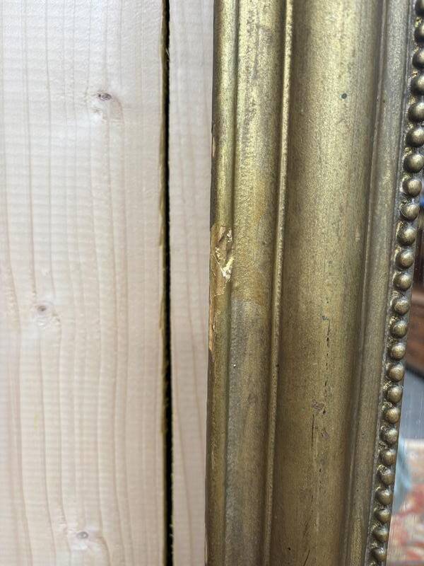 Miroir doré de style Louis XVI