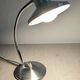 Articulated bedside lamp or wall light in aluminium, France circa 1960.