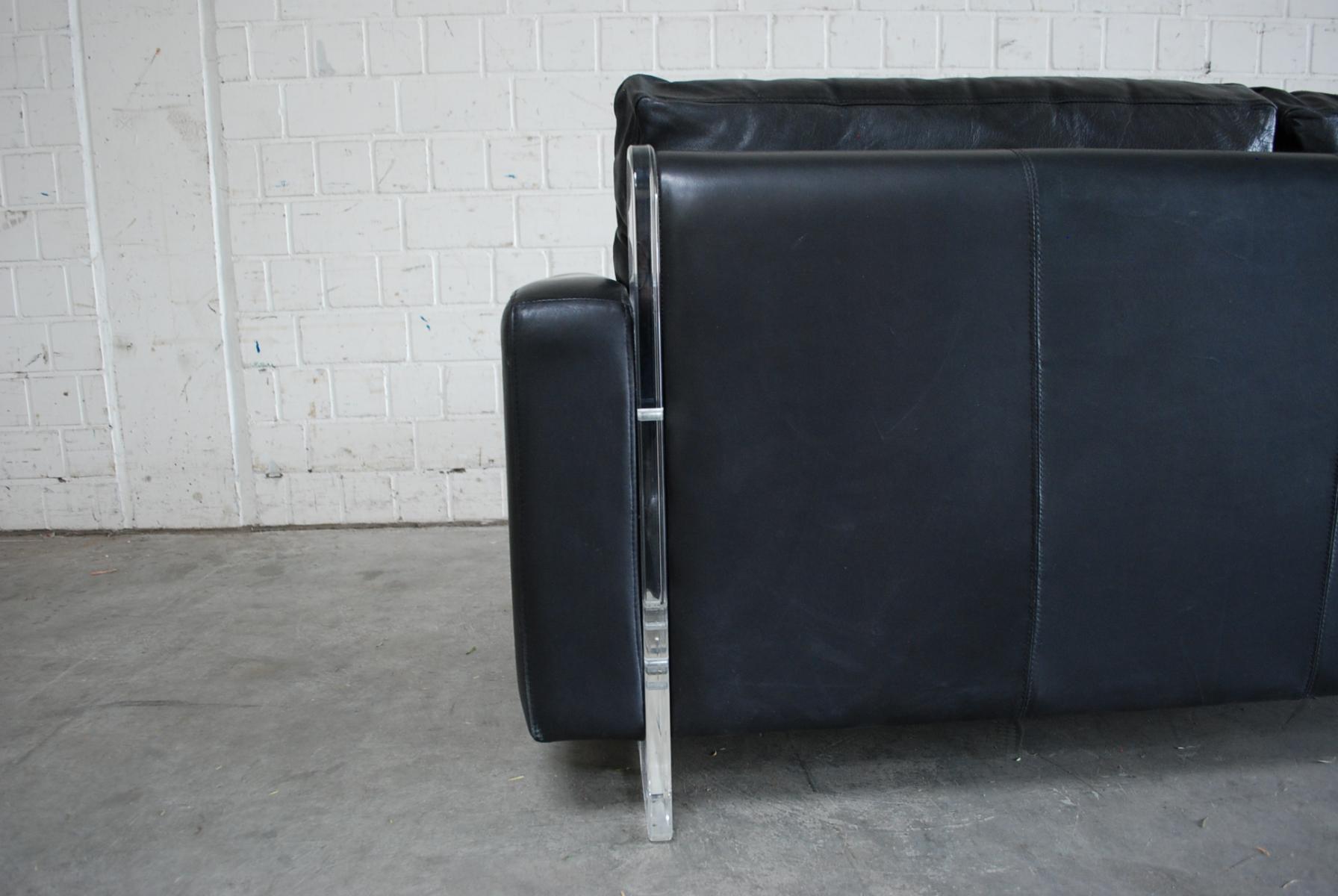 Vintage black leather sofa from Lavalina