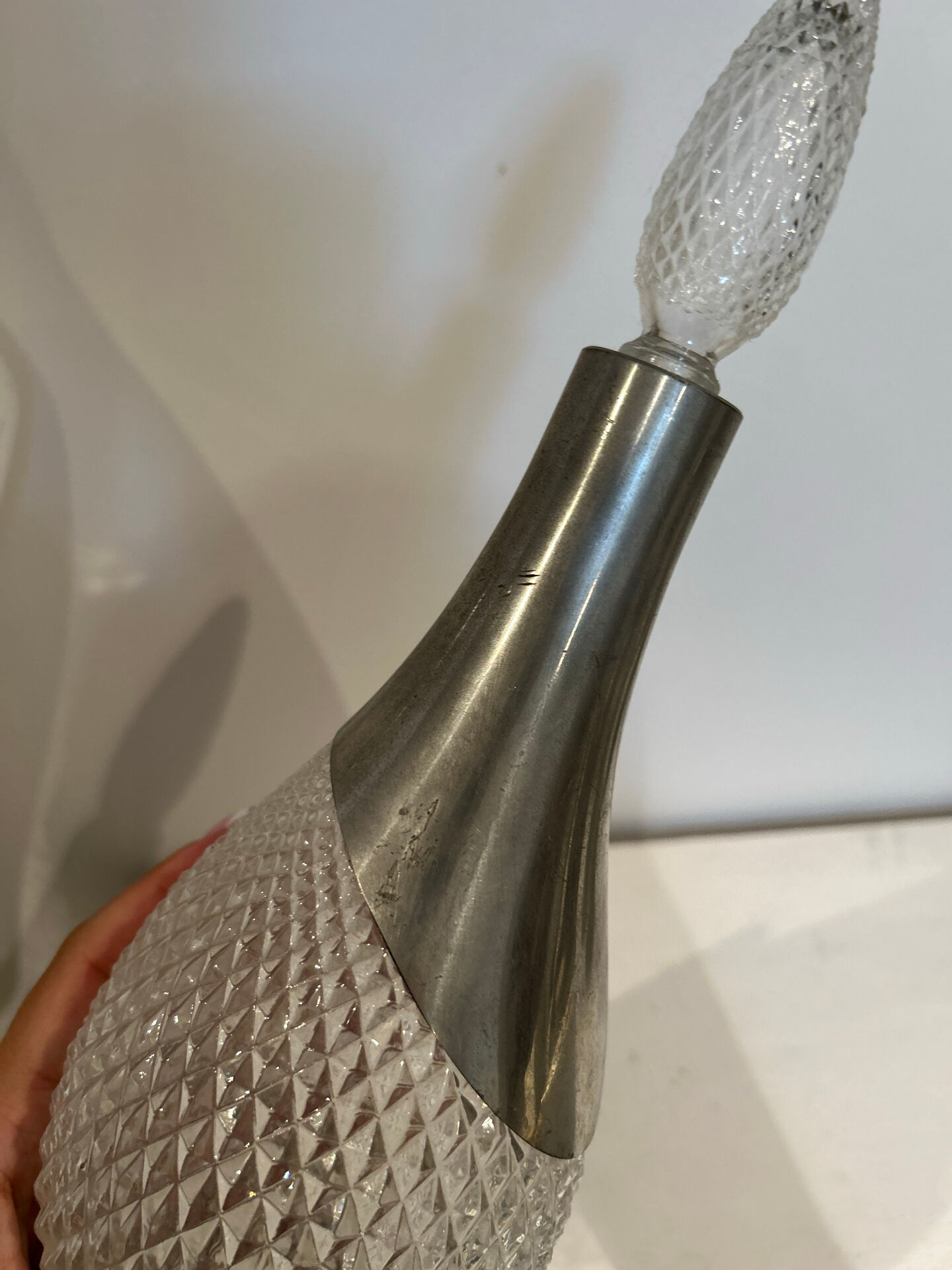 Cut glass carafe and pewter
