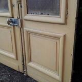Porte d'entrée cintrée double en chêne, grilles et verre, XIXème