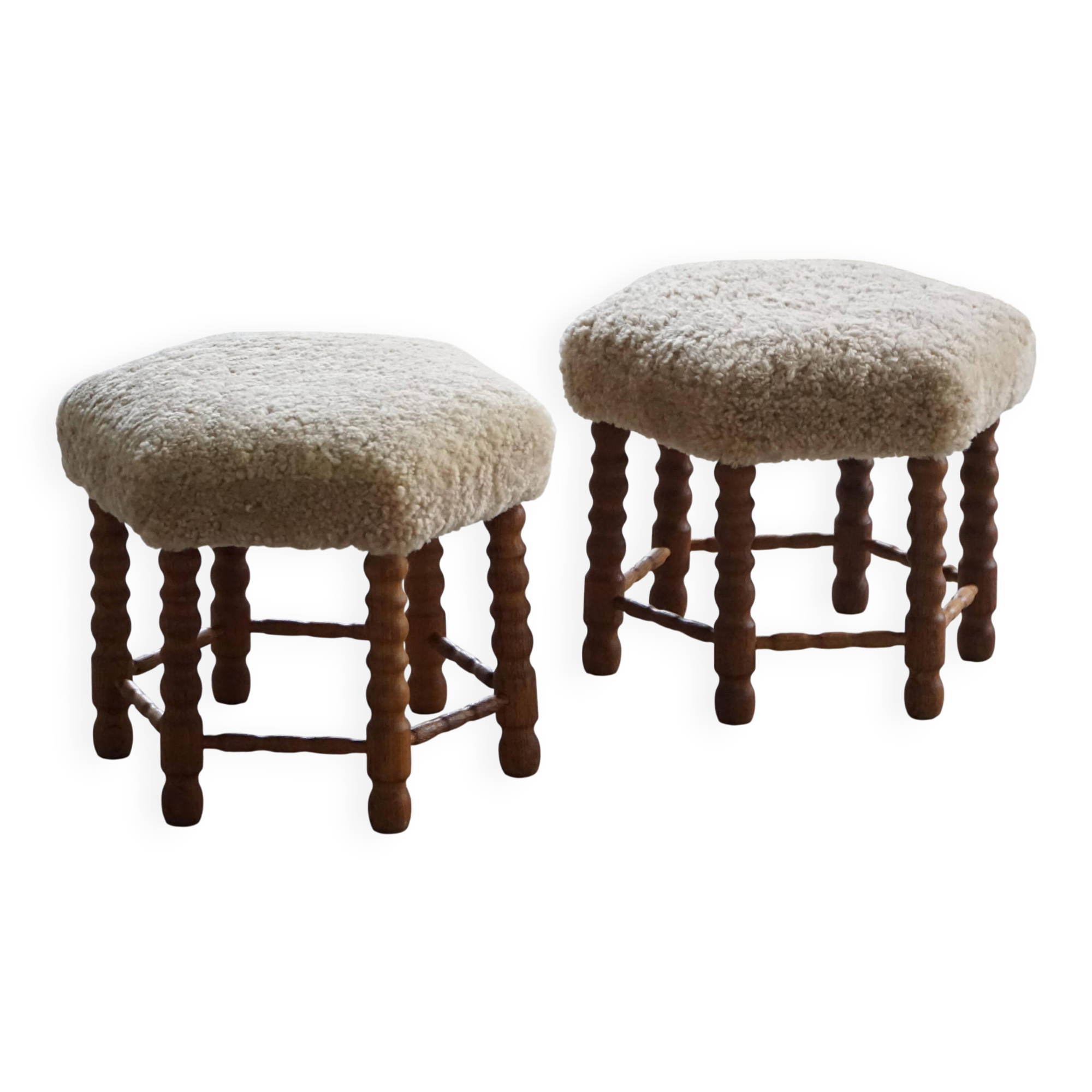 Pair of Danish oak stools from the mid-century with hexagonal seat and turned legs, 1950s.