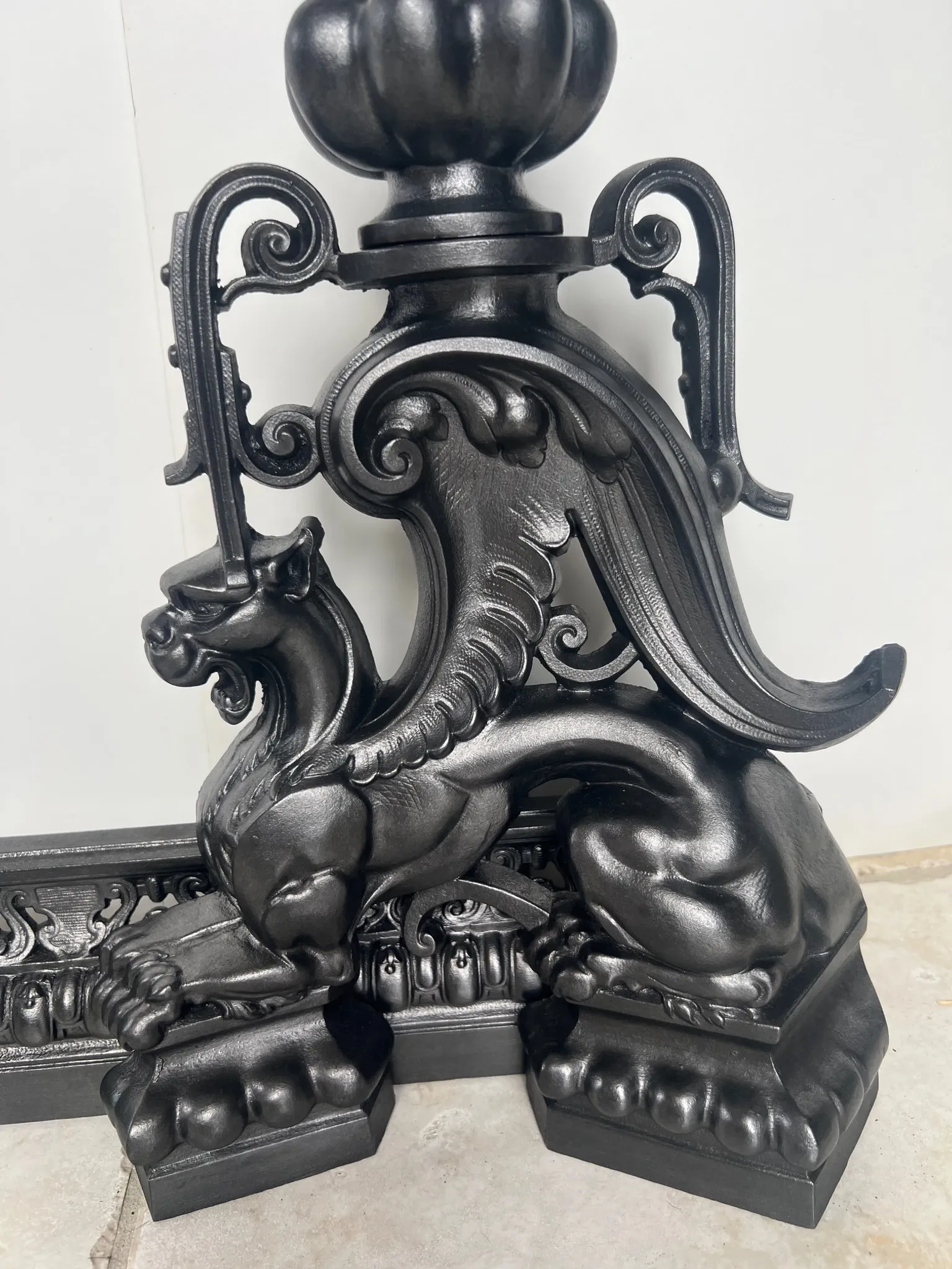19th-century cast iron fireplace set, bar, andirons & plaque with griffins