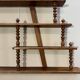 Turned wood bar wall shelf