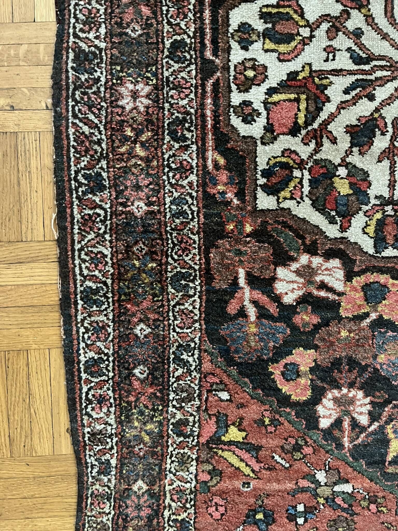 Antique handmade Hamadan Persian rug, ivory medallion on dark background 148x103.