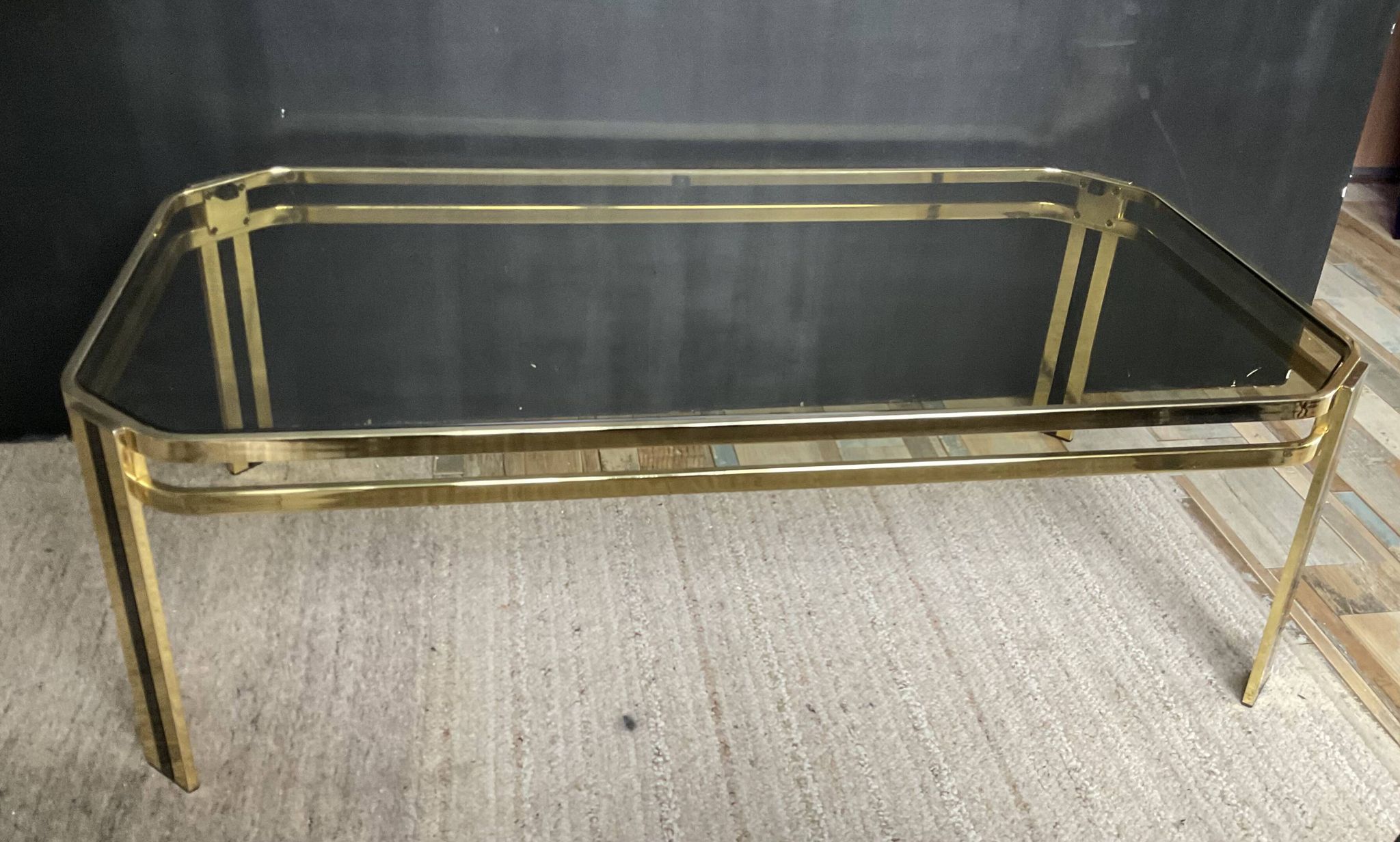 Vintage 1970s coffee table in gold metal and smoked glass.