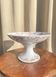 Coupe sur pied en porcelaine