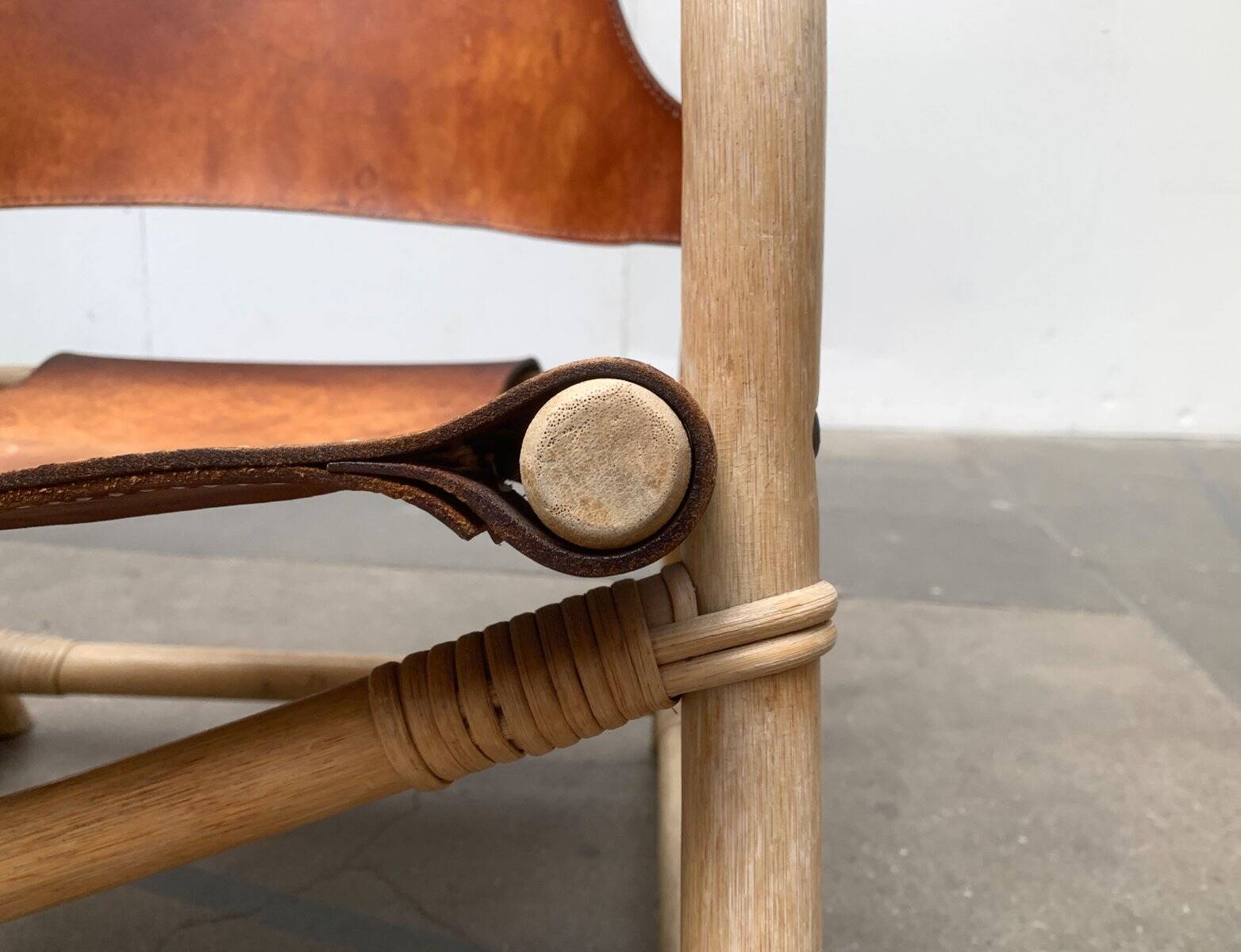 Mid-century safari lounge chair in bamboo and Danish leather, 1960s.