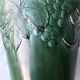 Green ceramic cache-pot