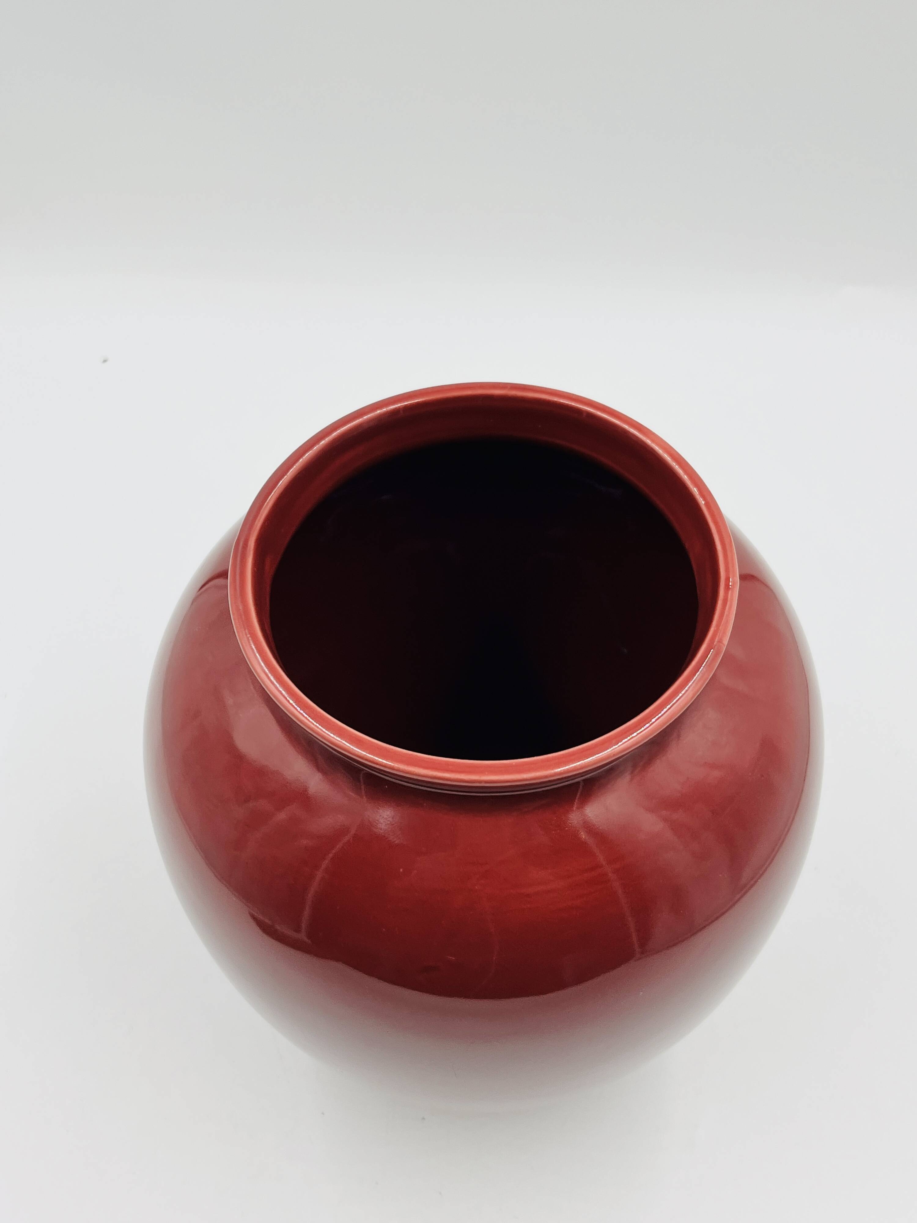 Vintage vase in glazed burgundy ceramic