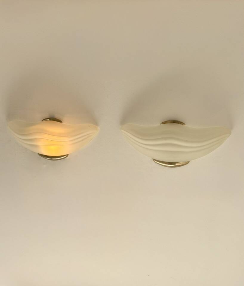 Pair of vintage wall lights in brass and frosted glass, Italy, 1970.