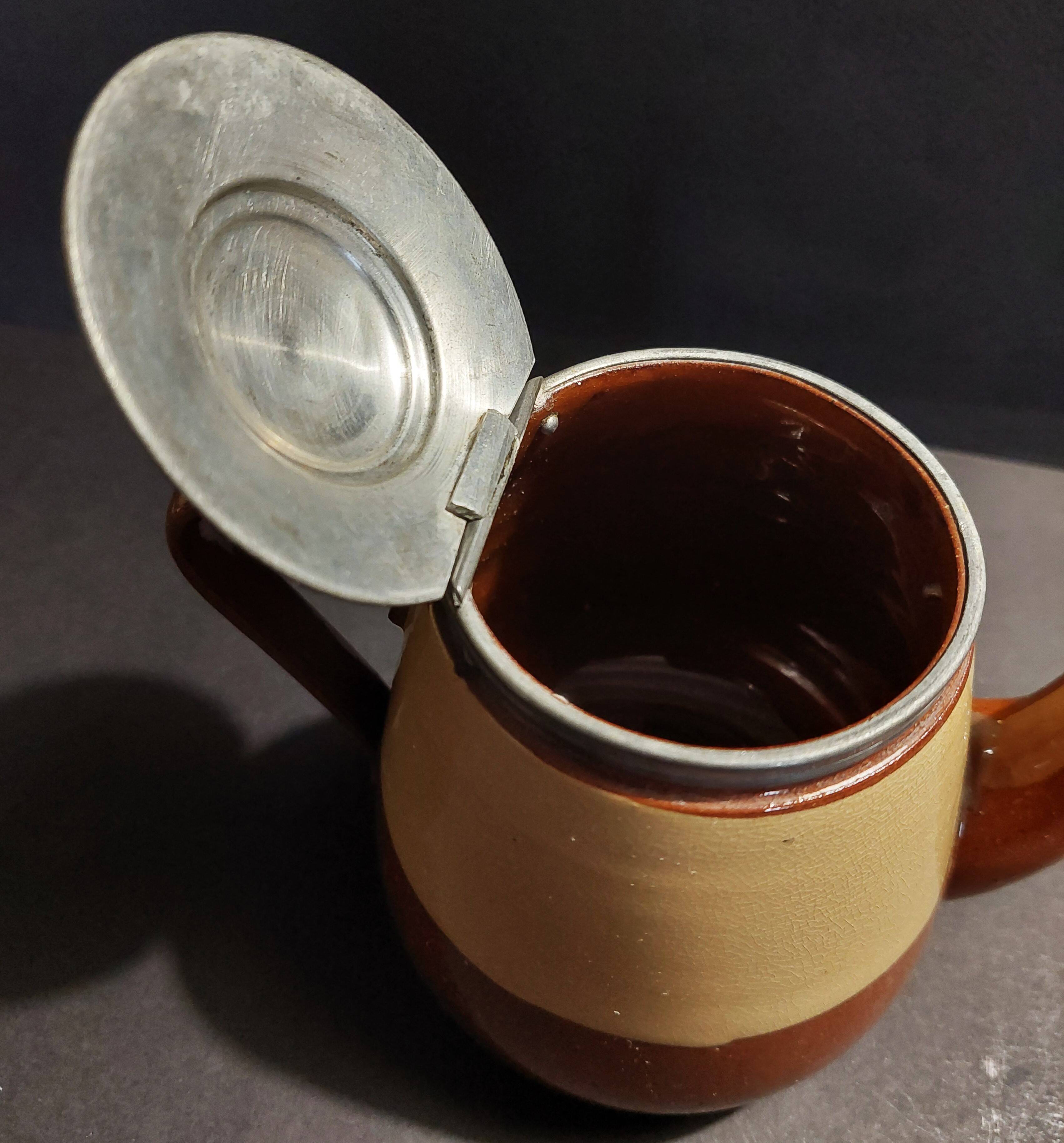 Beige and brown earthenware teapot with pewter lid, early 20th century