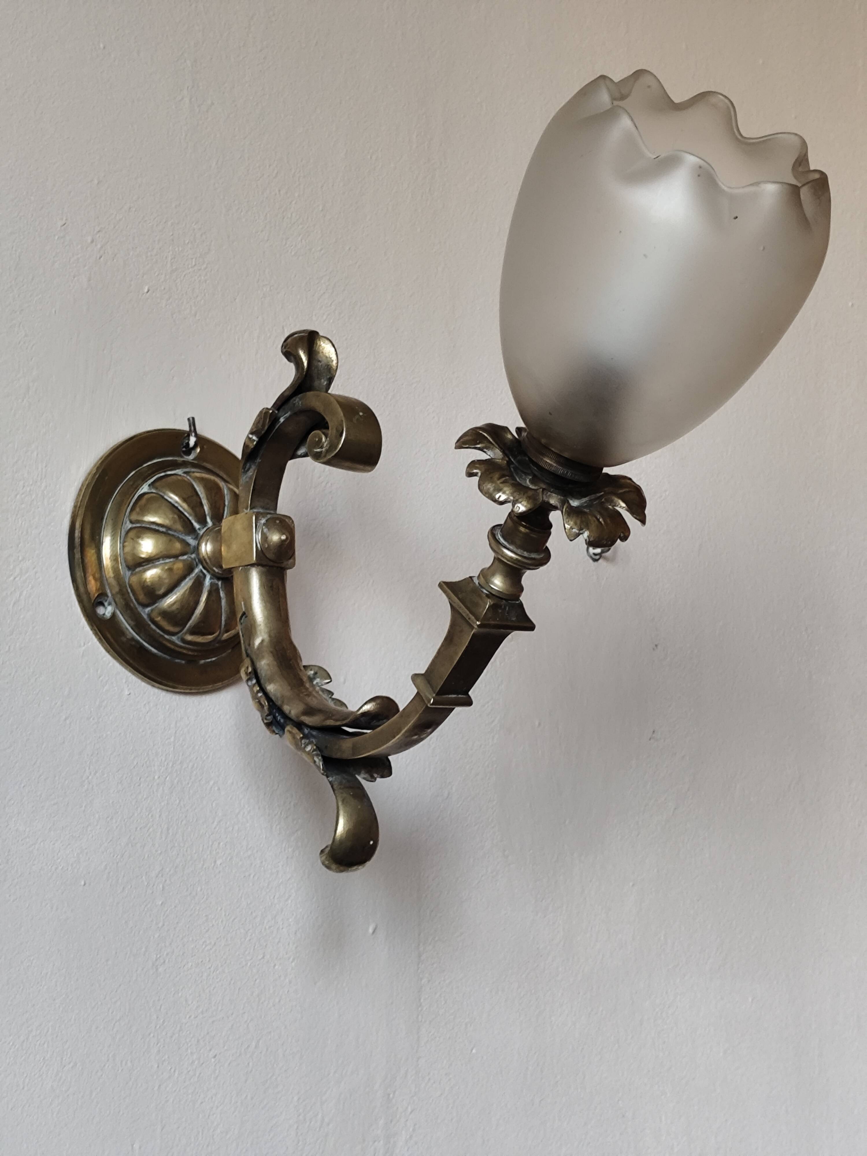 Bronze wall light with opaque glass tulip 1900