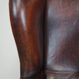 Large Sheepskin Leather Wingback Armchair with a Fixed Seat Cushion and a Stunning Patina