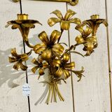 Old pair of gilded candlesticks