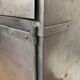 Old Industrial workshop furniture with 1 door 1 drawer in patinated iron