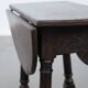 Antique English drop-leaf joint stool made of oak from the 18th century