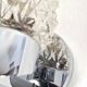 Pair of vintage Art Deco space age chrome and molded glass wall sconces