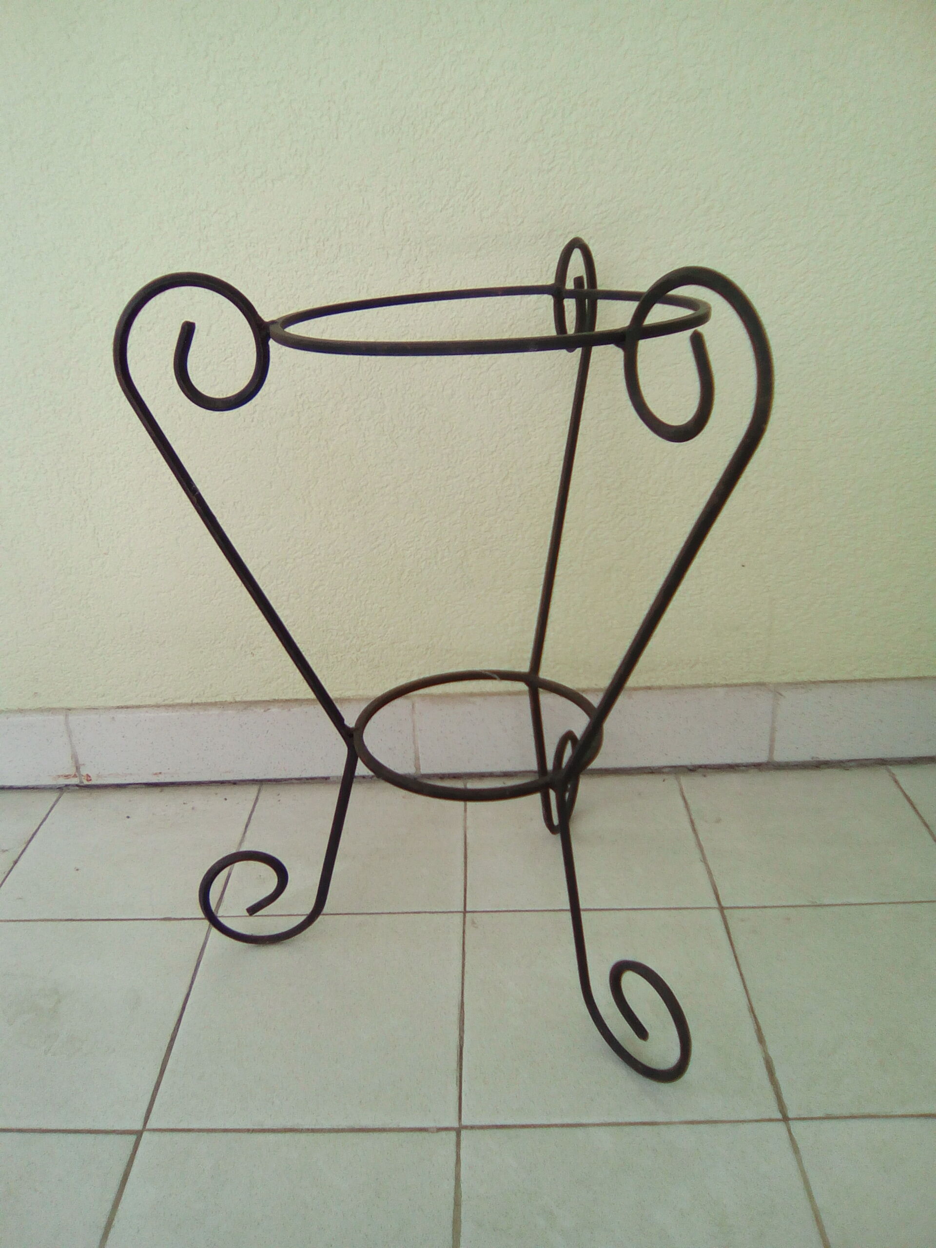 Wrought iron flower pot support