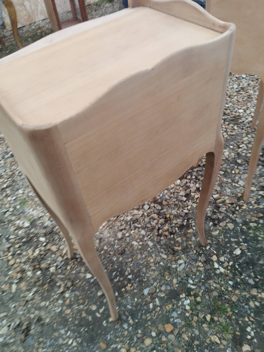 Pair of antique wooden bedside tables in Louis XV style.