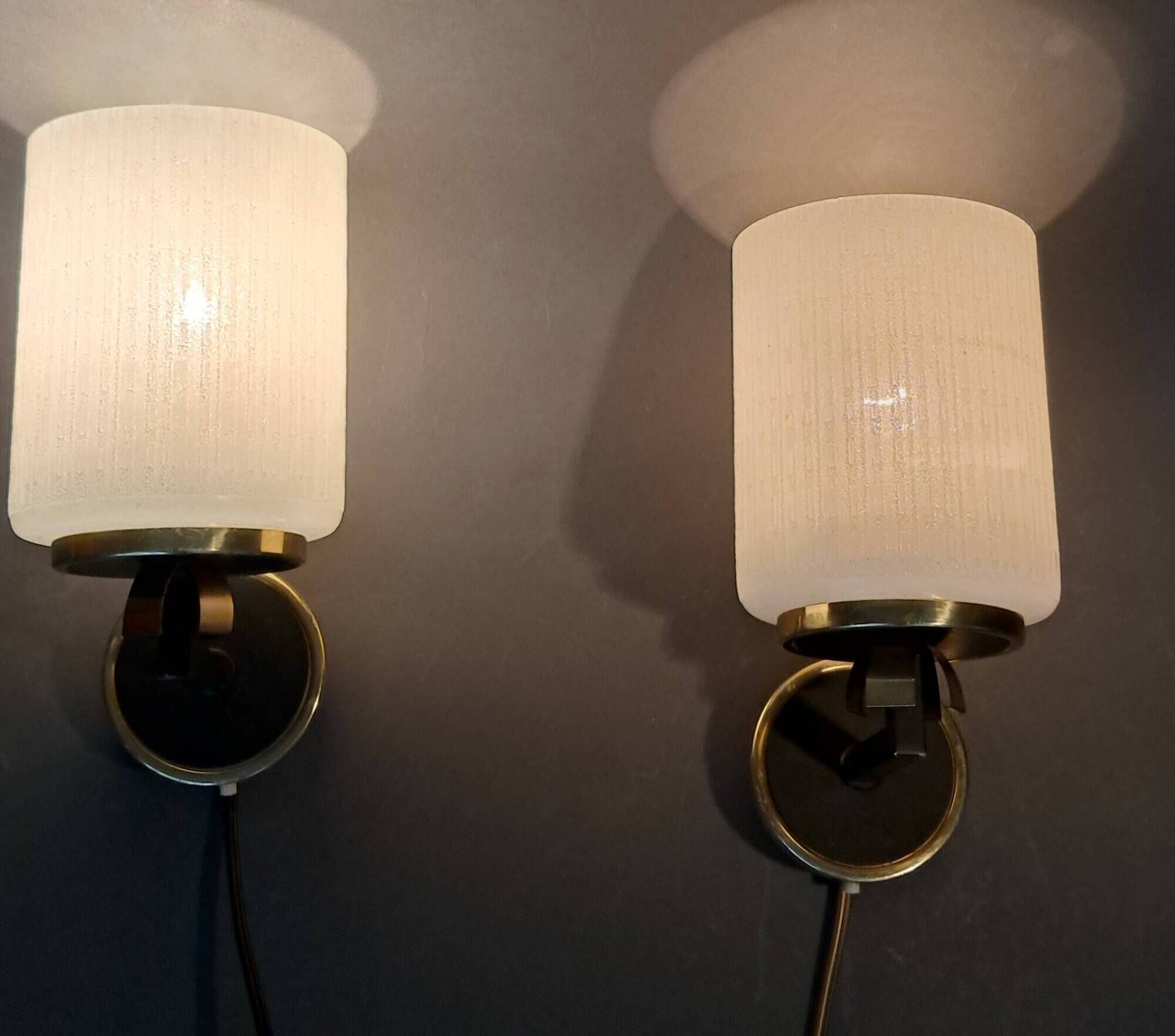 Pair of wall lights in gilded brass, black metal and opaline, 1960