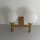 Double opal glass and heavy brass, large minimalist cinema wall light, 1960s, Germany
