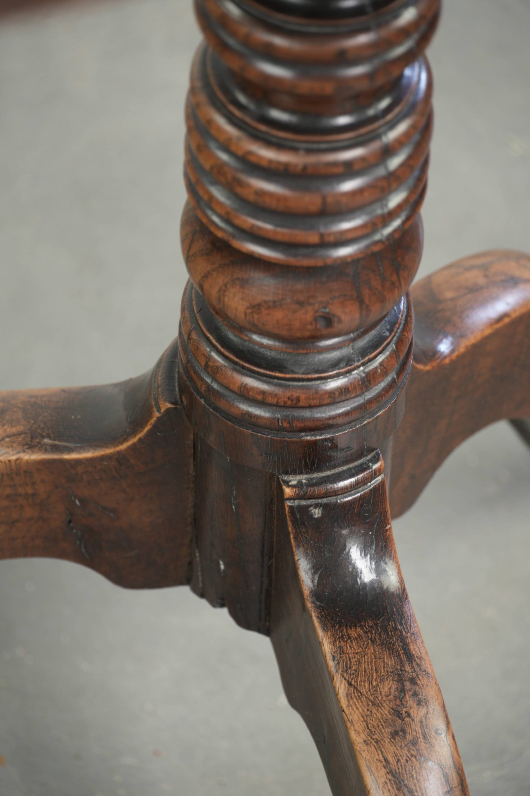 Antique English oak tilt top table from the 19th century in a unique shape