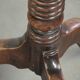 Antique English oak tilt top table from the 19th century in a unique shape