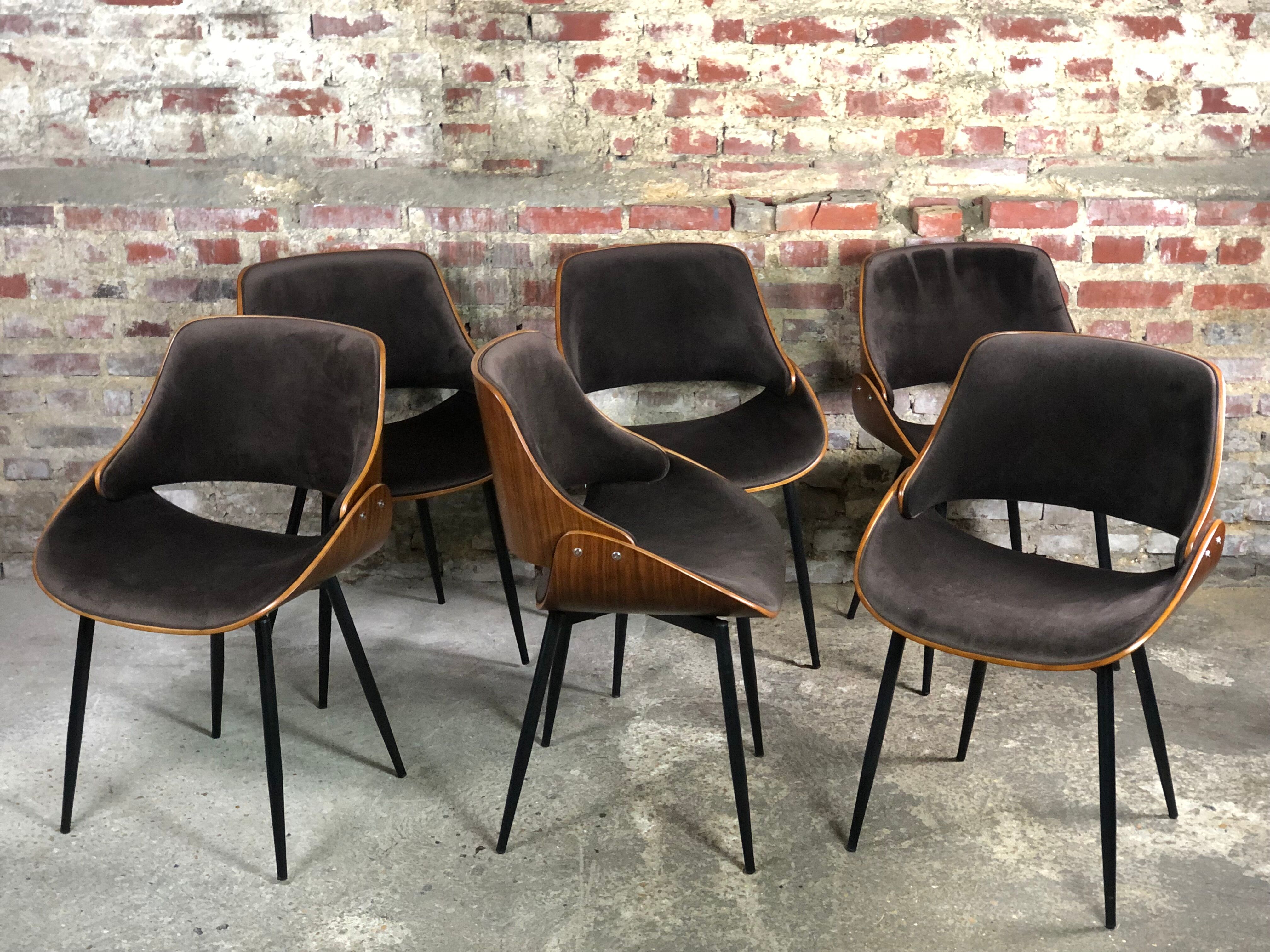 Scandinavian style chairs in curved plywood covered with brown fabric