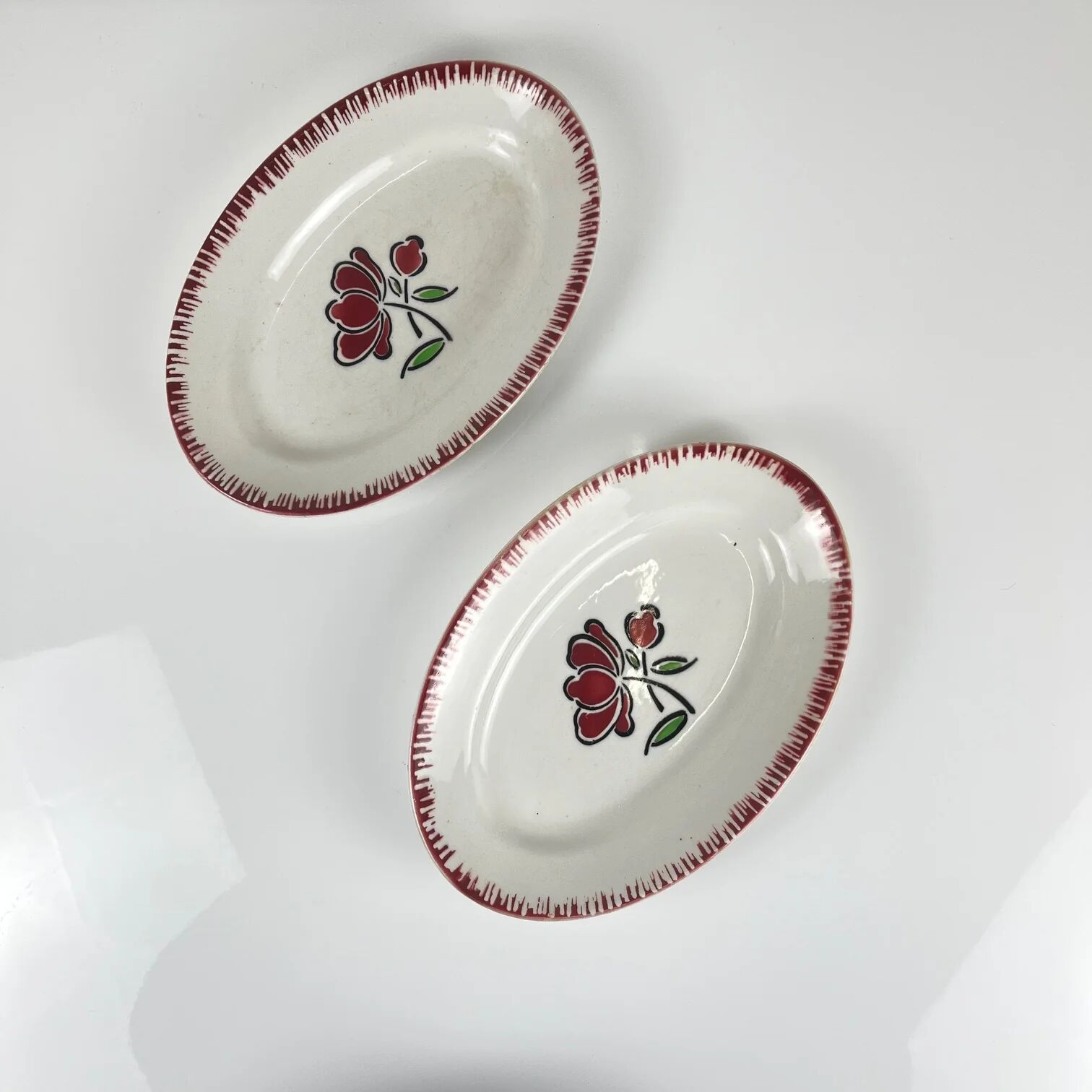 Pair of porcelain serving dishes, Badonviller, red flower, 1950