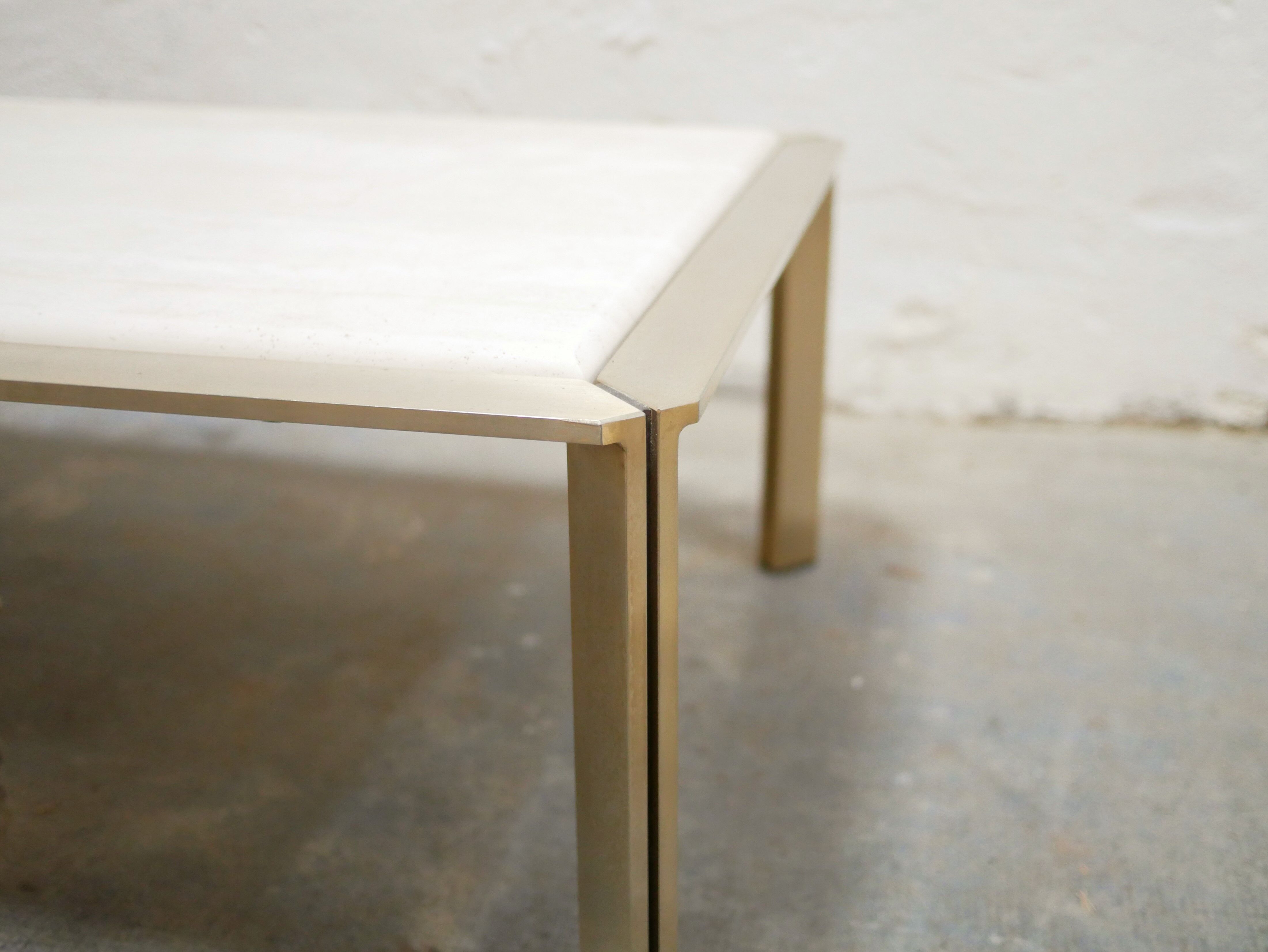 Vintage coffee table in travertine and brass