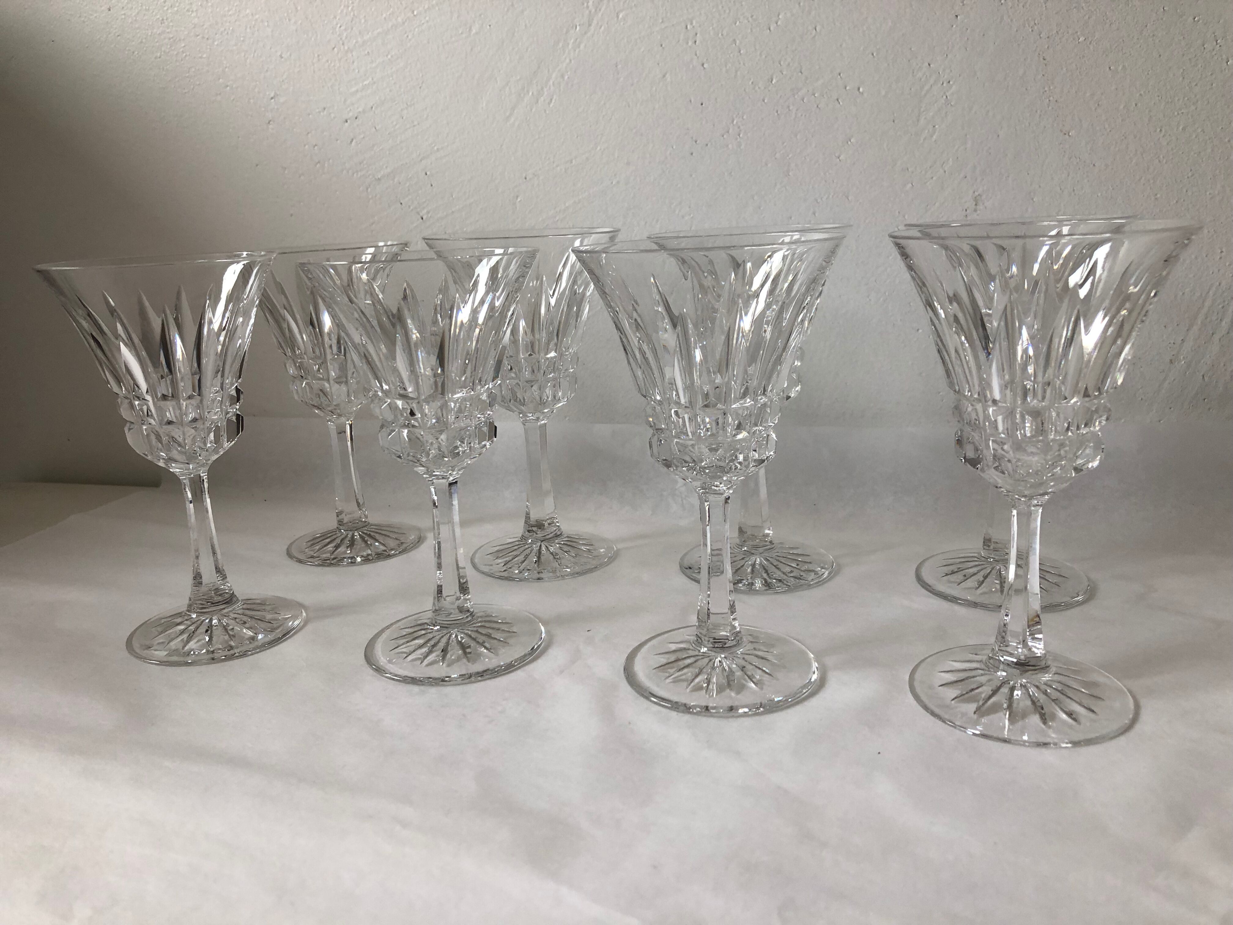 Eight Baccarat crystal wine glasses