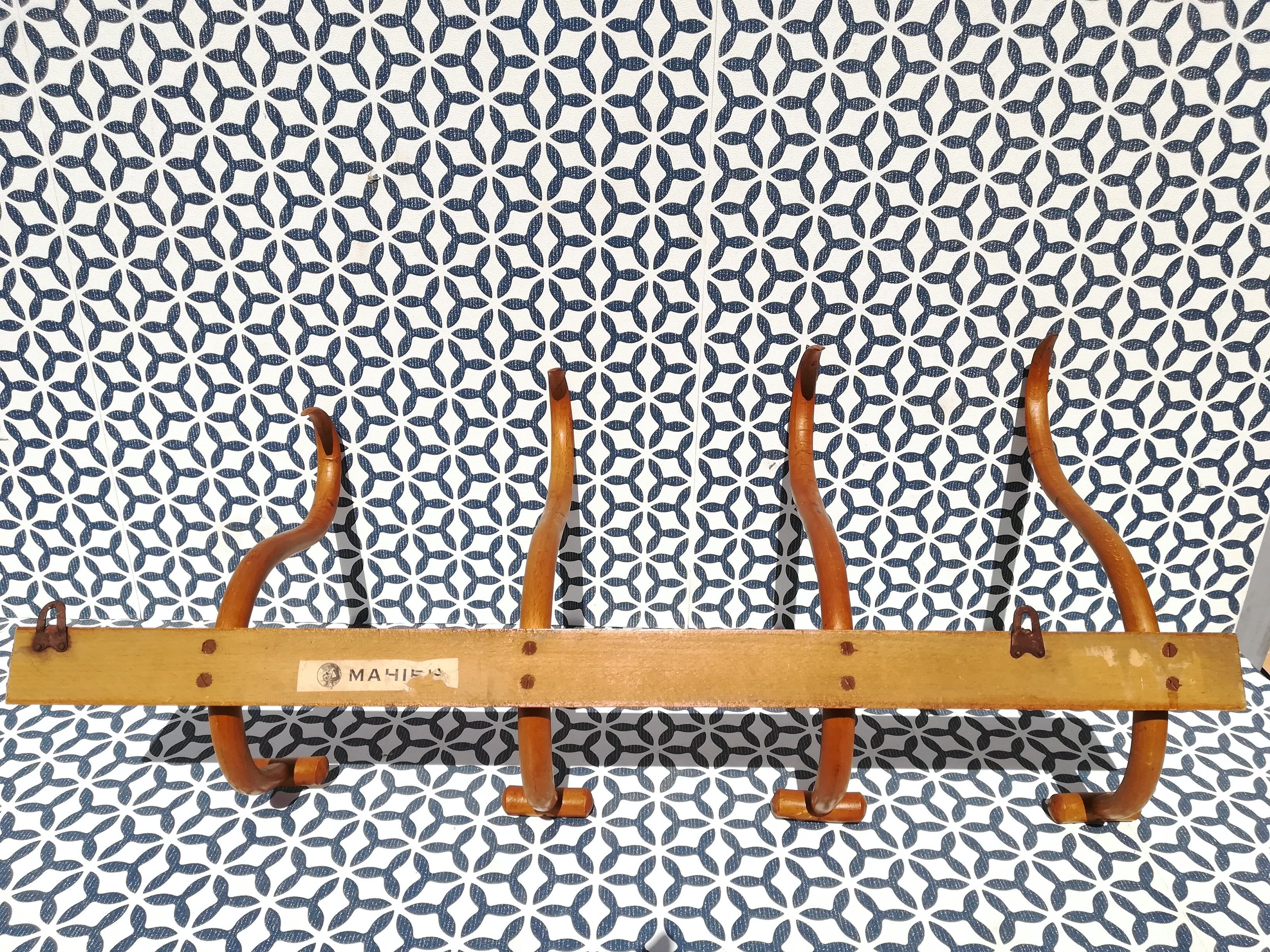 Patère wears Mahieu coat