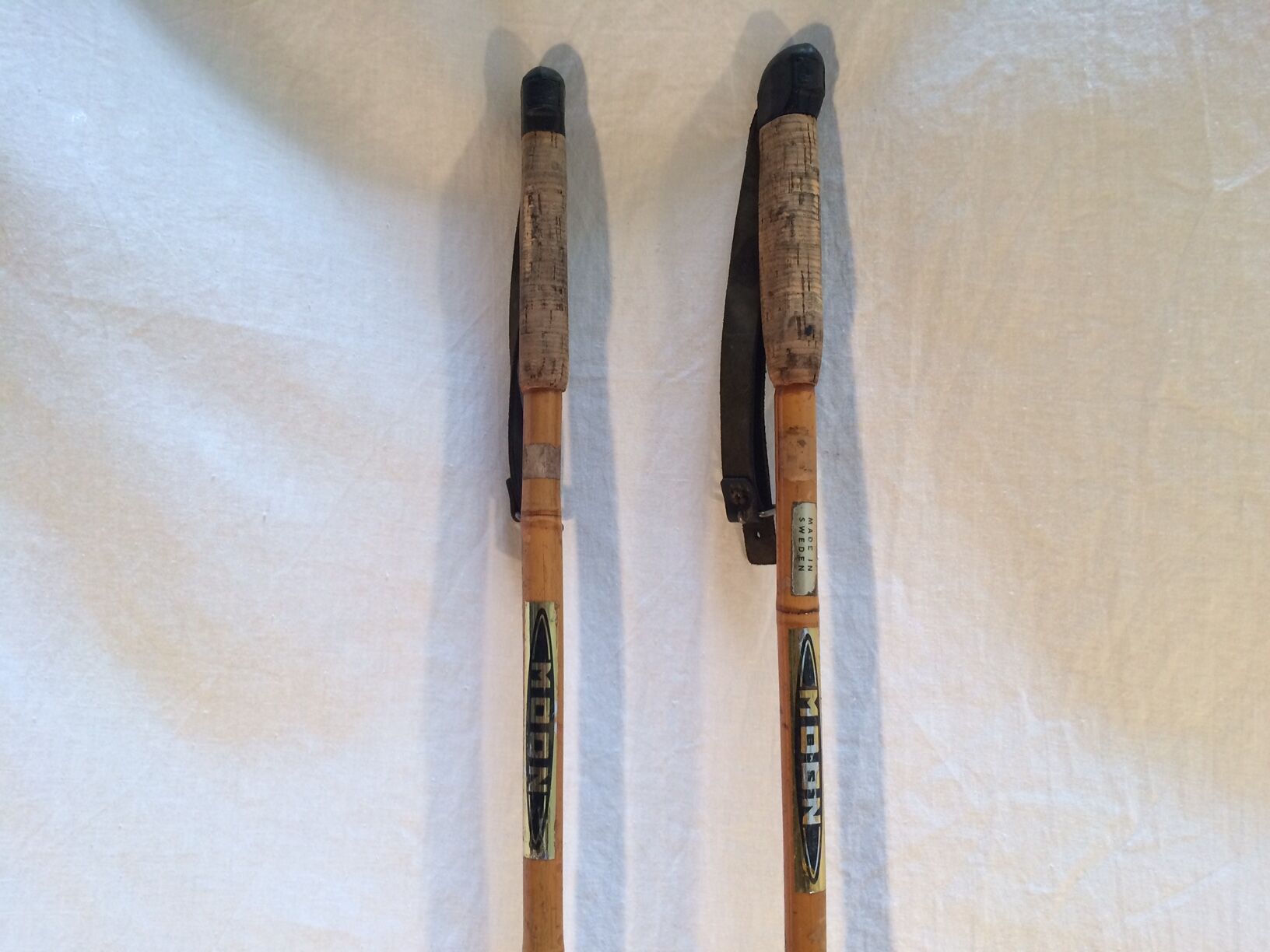 Ancient wooden and cork ski ings