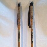 Ancient wooden and cork ski ings