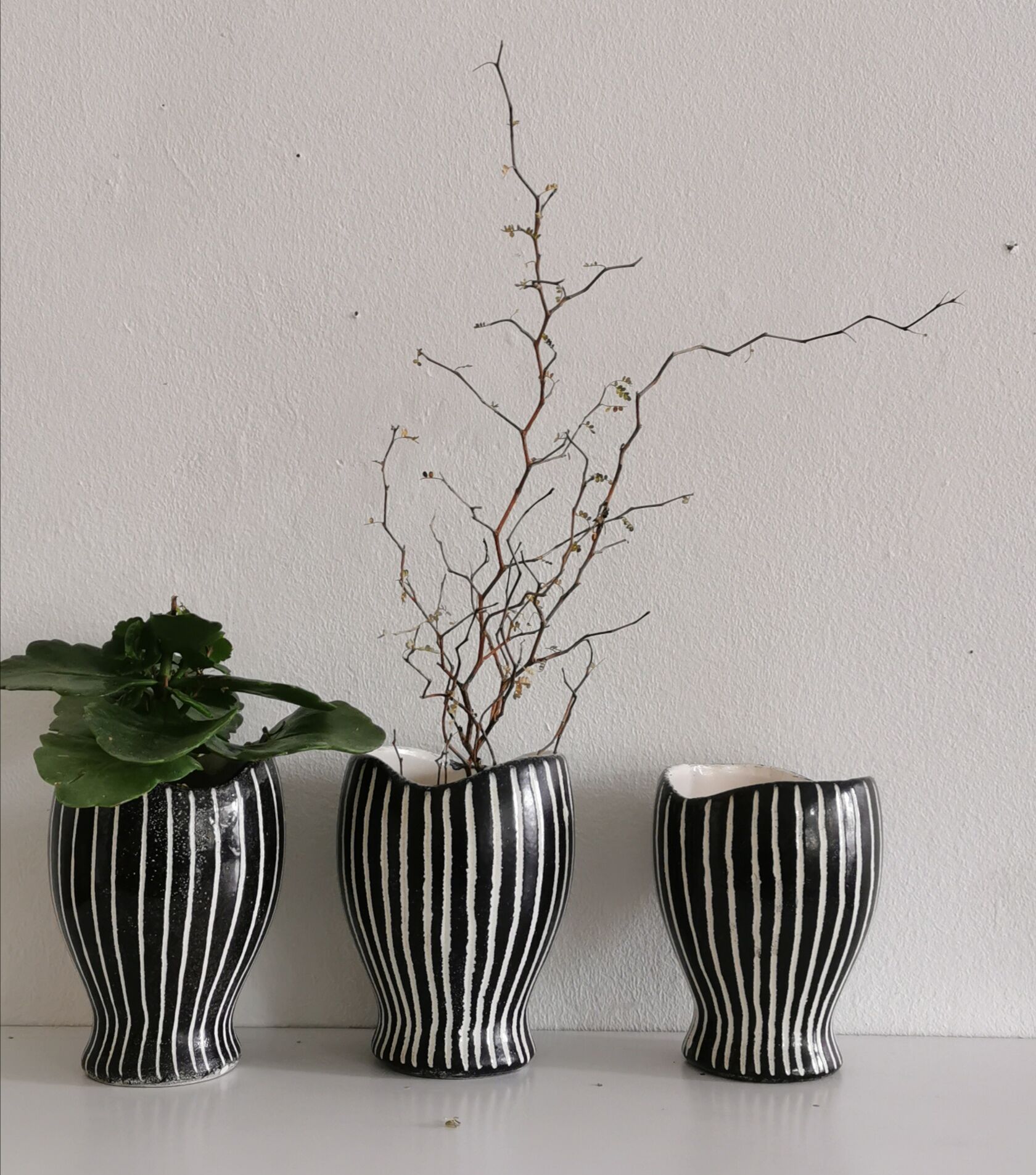 Series of 3 black and white ceramic pots 1950