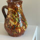 Studio ceramic pitcher with sprayed glazes – circa 1960-70
