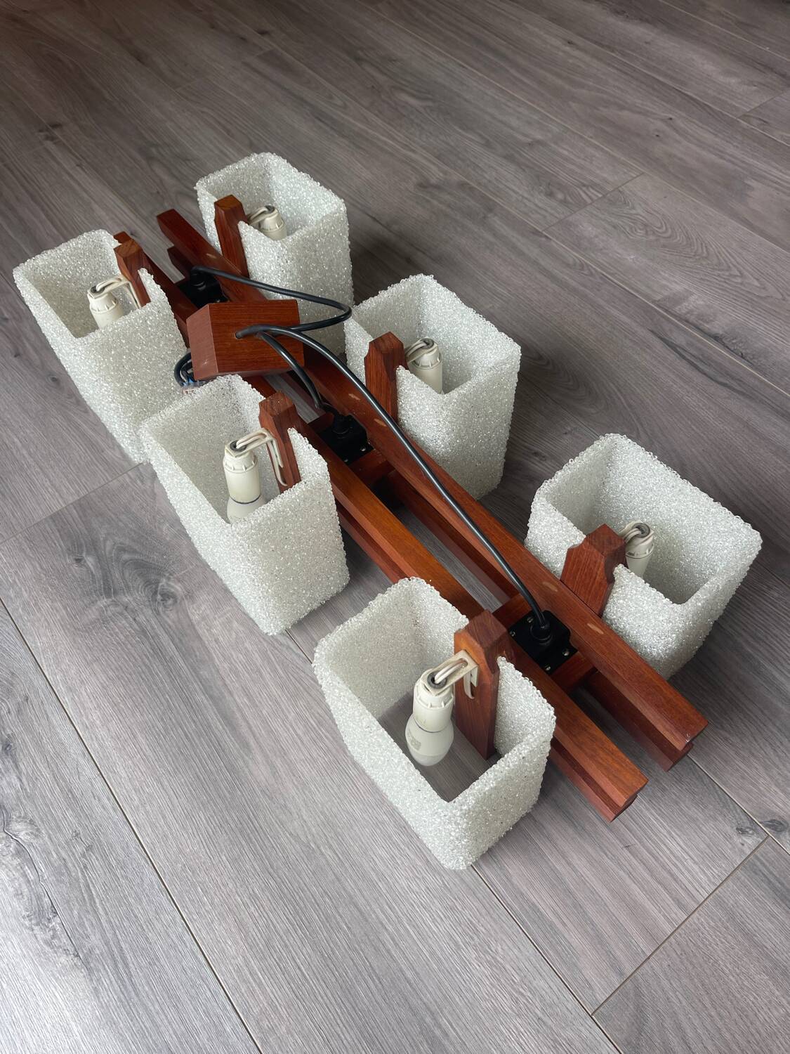 Scandinavian chandelier with 6 lights in teak and a perspex shade.