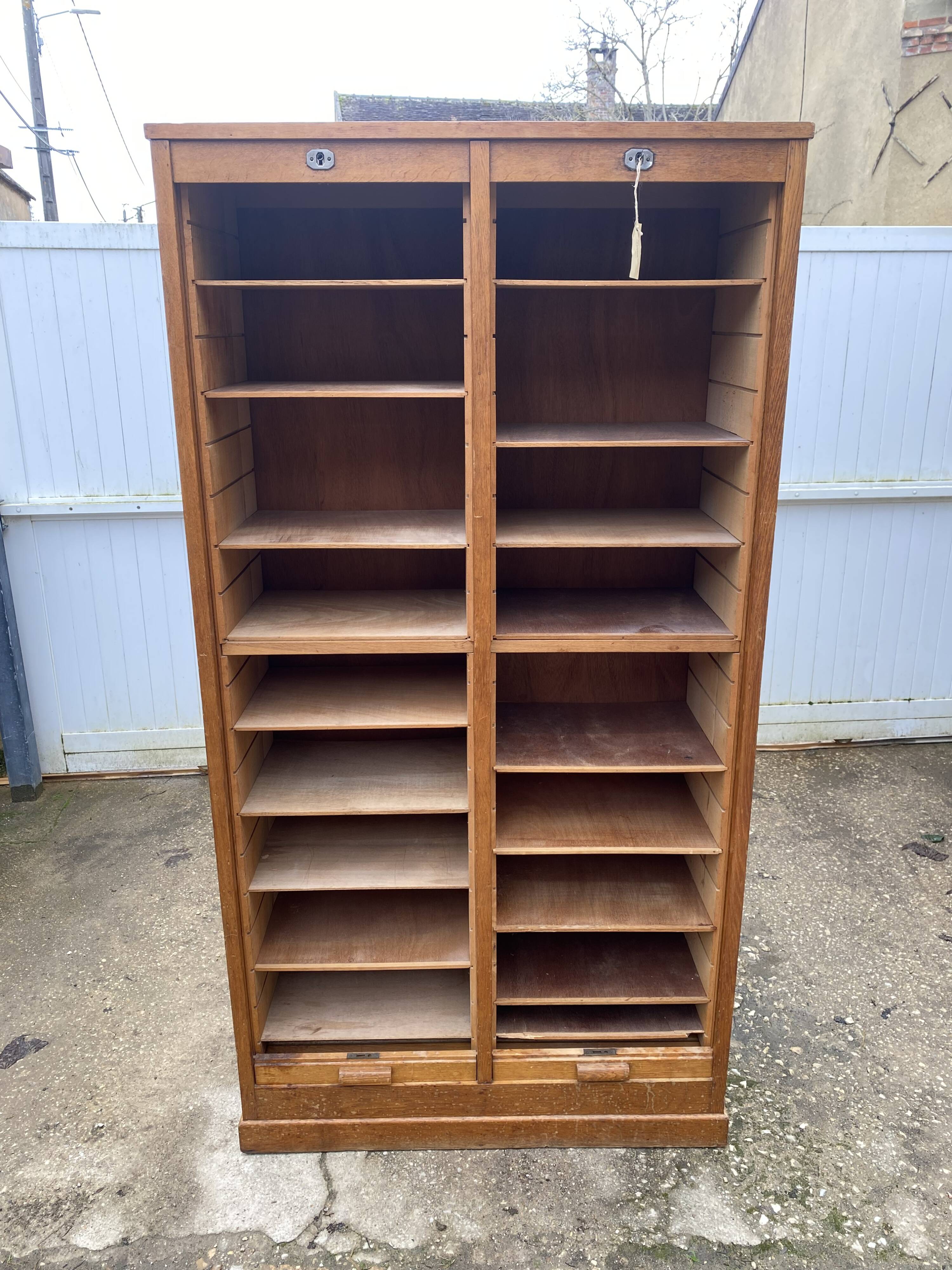 Double-column oak filing cabinet with curtains, 1950s.