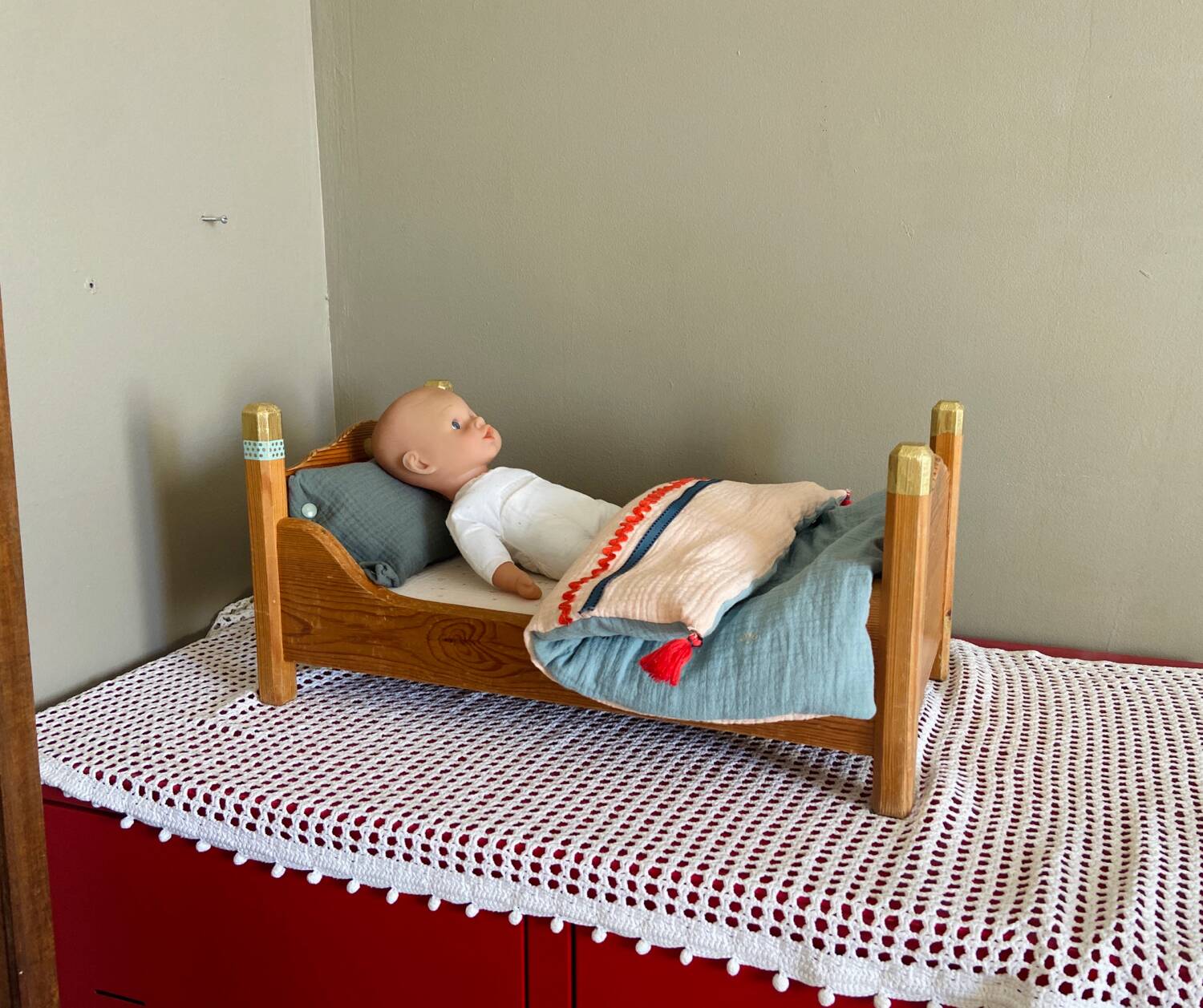 Wooden doll bed