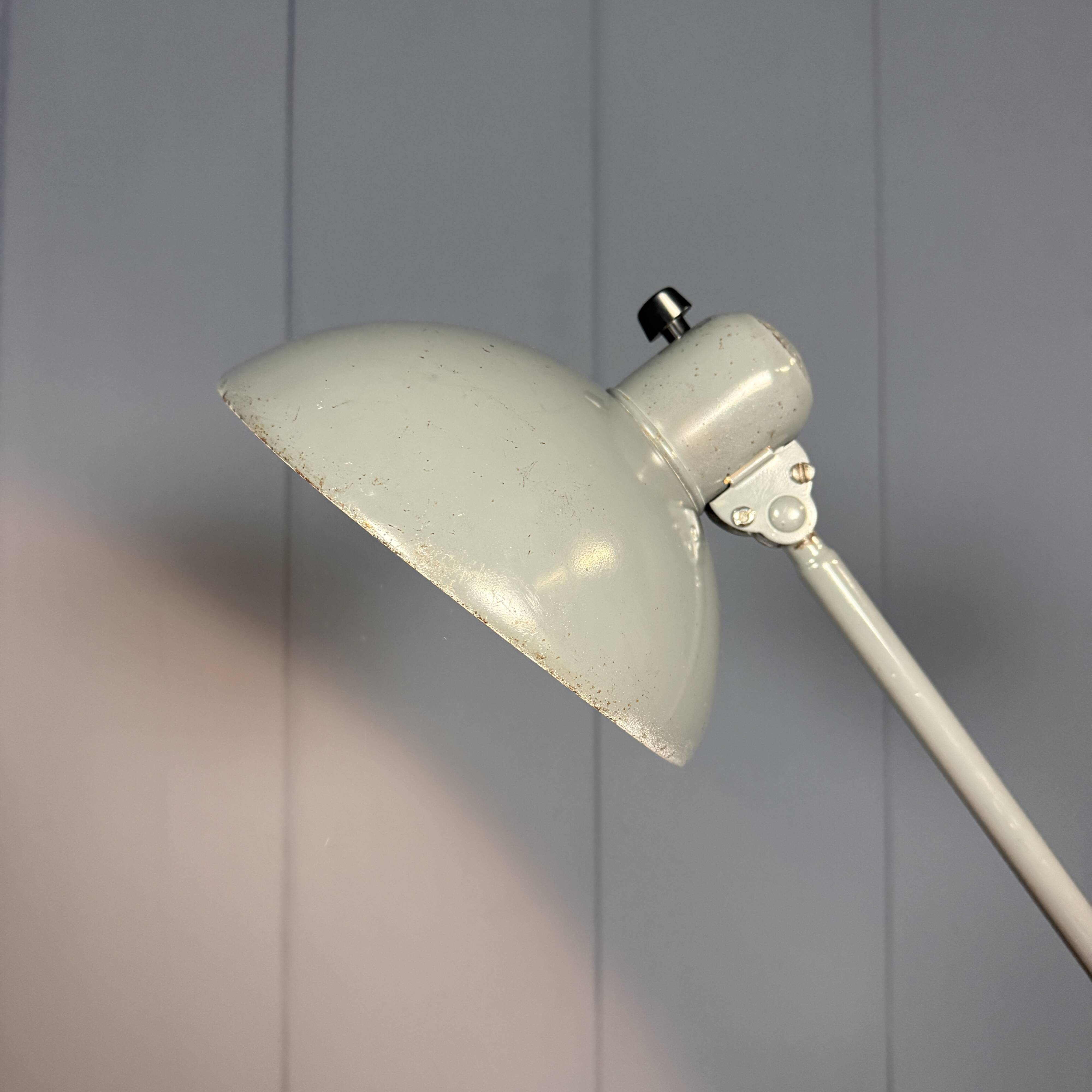 Grey two-arm Kaiser Idell clamp lamp model