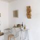 rattan wave wall-mounted magazine holder