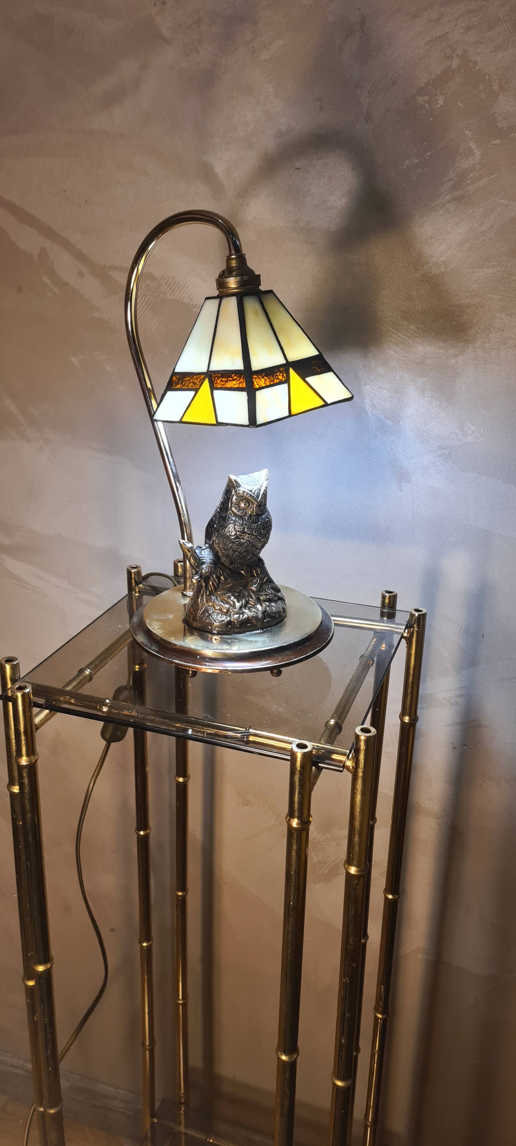 Owl-shaped designer bedside lamp, solid bronze owl with glass lampshade