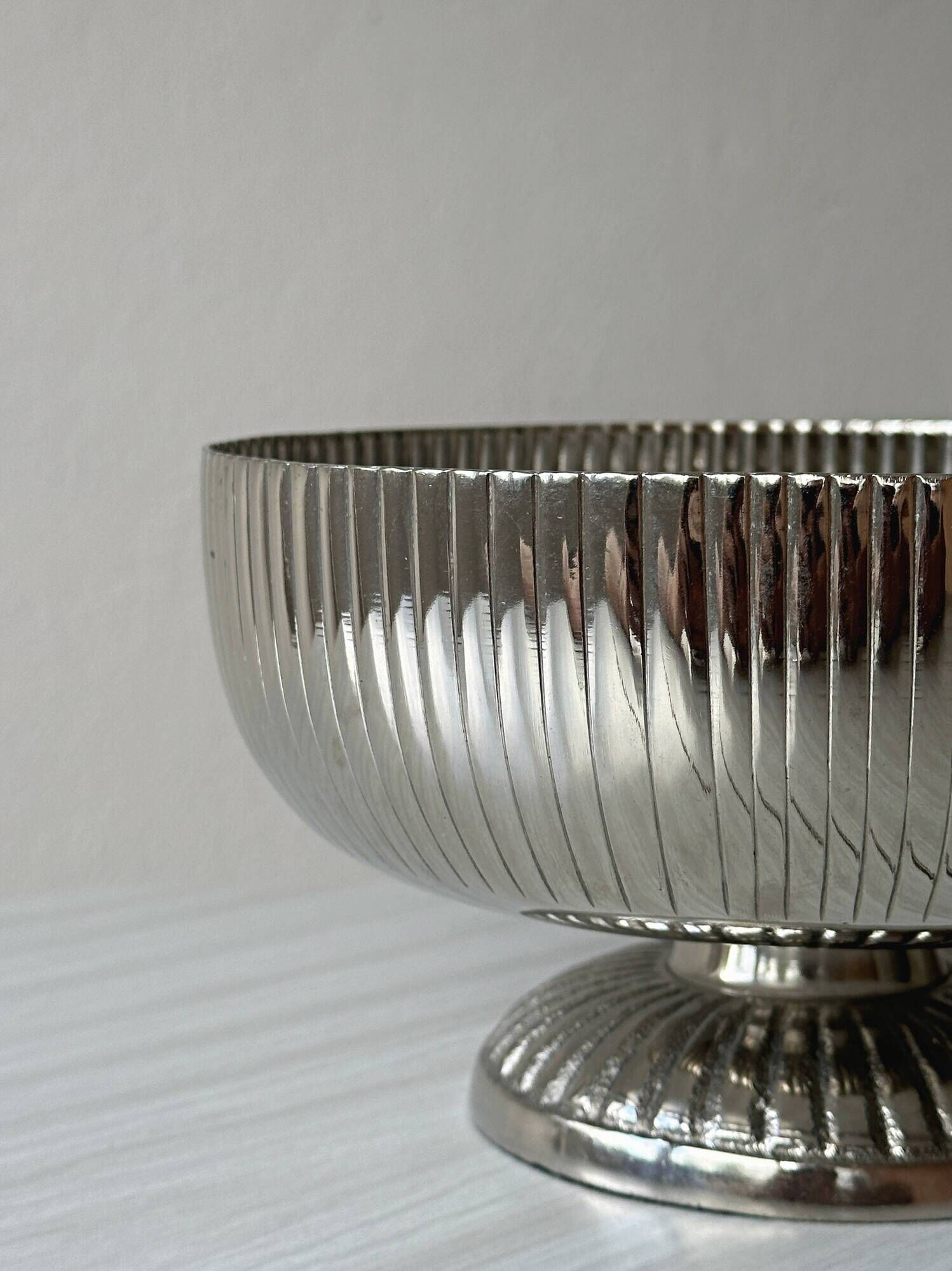 Silver stainless steel pedestal bowl