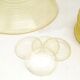 10 assiettes, un grand plat central et 4 sous-verres